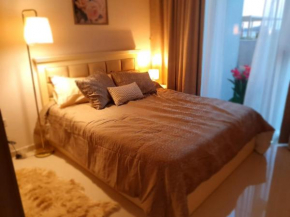 Elite Inn: Damac320 Cozy 1 BR Apartment with Patio